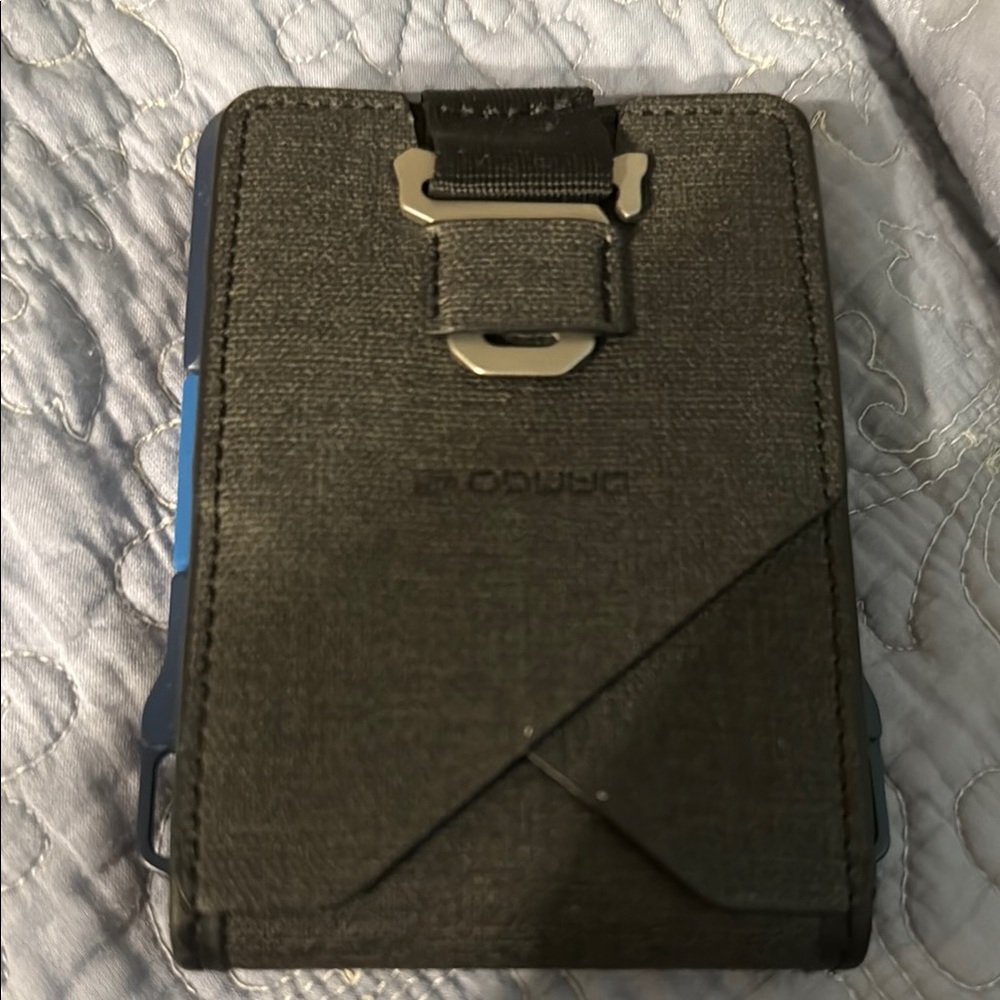 Sleek Black Leather Wallet with Bifold Design and Metallic Clasp